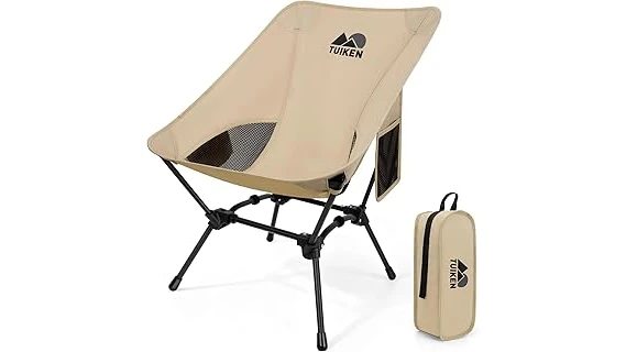 The image shows a comfortable camping chair with a cup holder, perfect for outdoor relaxation.