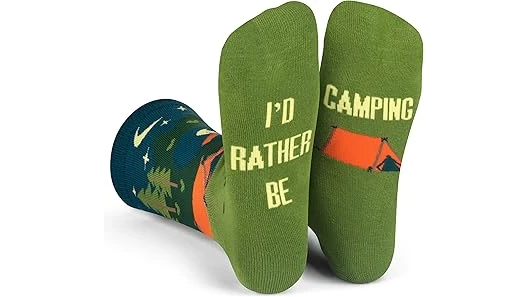 This image shows a dad enjoying a campout with his family, featuring the top rated Father's Day camping gifts.